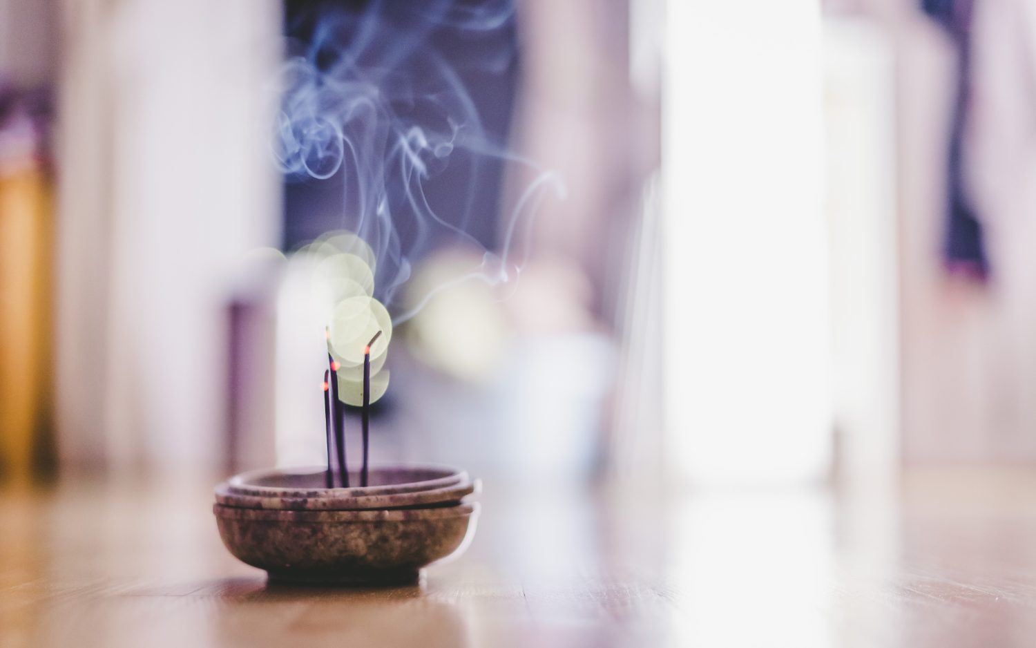 Smoke rising from a ceremonial bowl